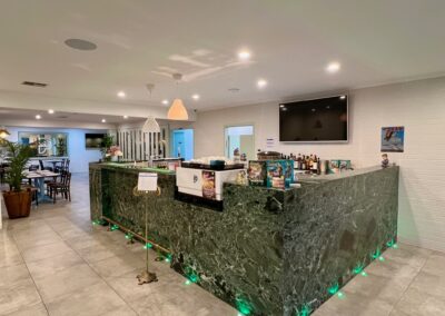 Stylish bar area at Best Western Adelaide Airport Motel, featuring sleek modern furniture and ambient lighting